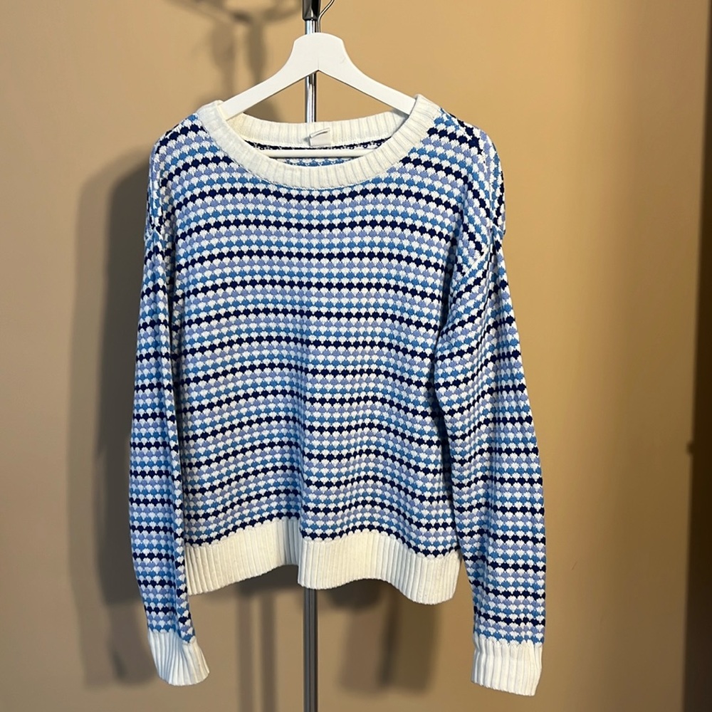 Multicolored sweater.